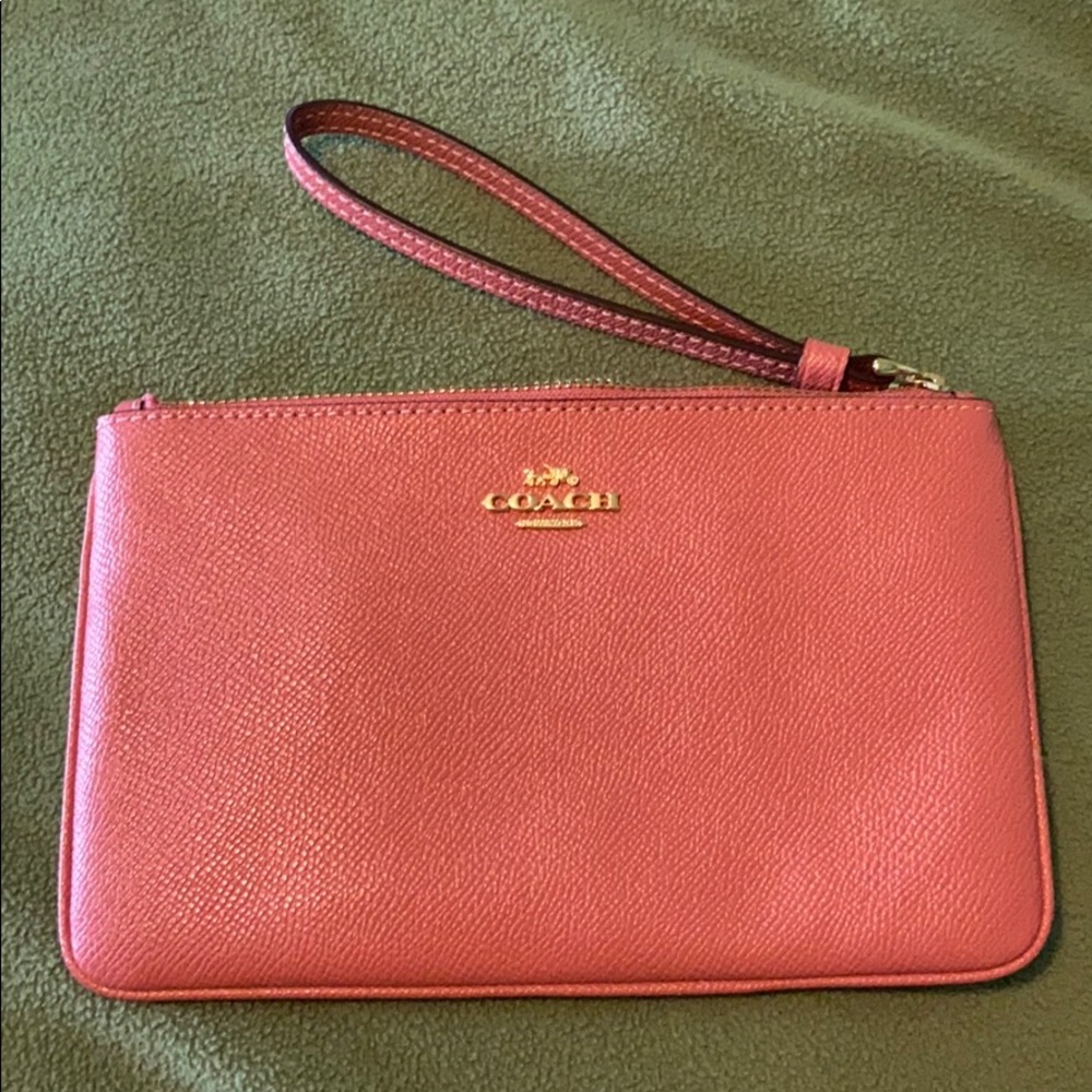 New pink leather Coach wristlet 8x5